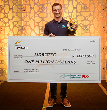 Lidrotec CEO with faux million-dollar check