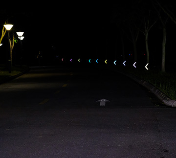 photo of nighttime scene with colored directional indicators using material