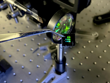 Quantum-Dot Infrared Lasing at Room Temperature