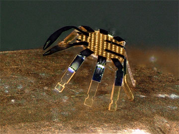Tiny Robot Crabs Controlled with a Laser